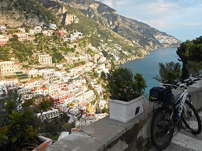 View from above Positano, with a mountain bike. Cycling Amalfi Coast